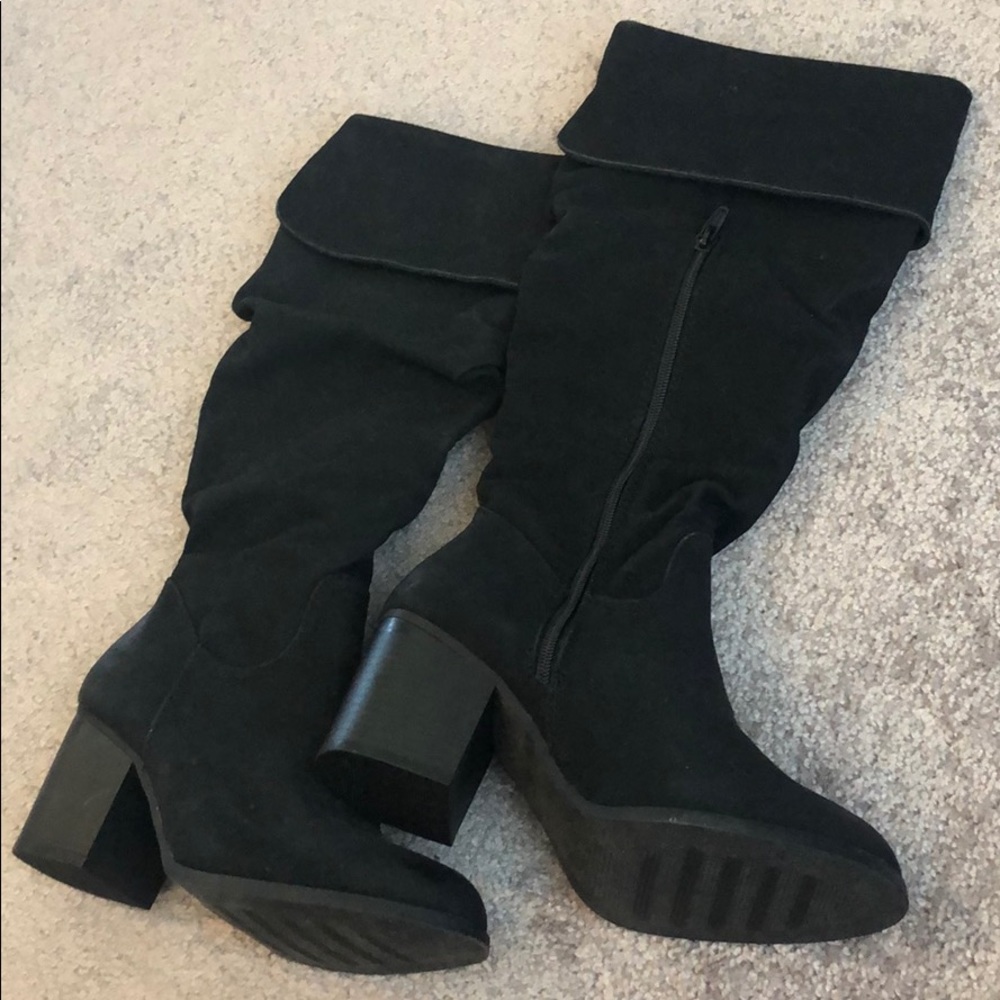 Under the knee black boots